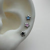 Puffy star stud piercing