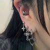 White cross ribbon piercing