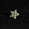 Black checkered star piercing