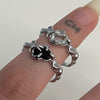 Black stone claw melt ring