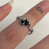 Black stone claw melt ring