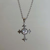 Reversible shiny cross necklace