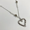 Heart melt pearl necklace and earring set
